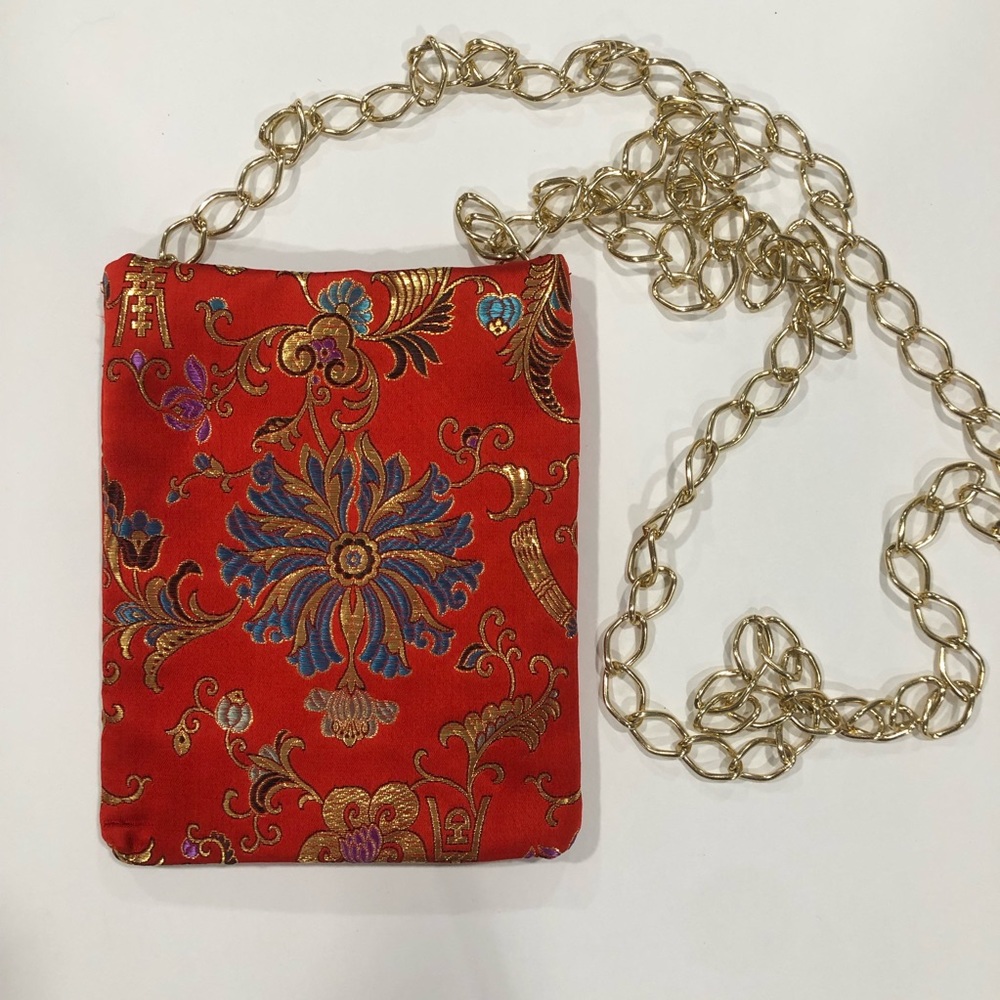 NEW small red Asian design crossbody bag with gold chain strap. Teal lining ❤️